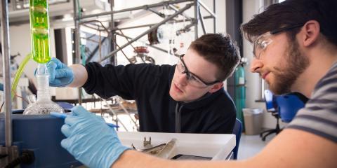 UNH Students working on a project in a science lab