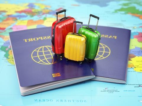 picture of passports and small suitcases